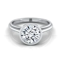 Platinum Round BrilliantBezel Halo Cathedral Solitaire Engagement Ring