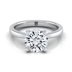 Platinum Round Brilliant Diamond Adorned Claws And Secret Halo Solitaire Engagement Ring -1/10ctw